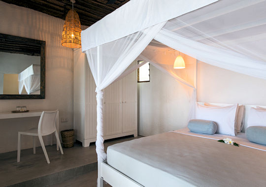 Deluxe kamer bij Chuini Zanzibar Lodge