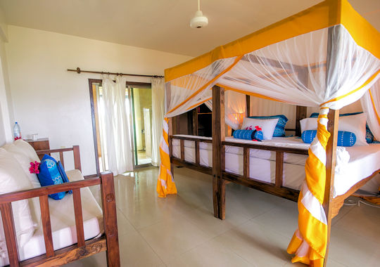 Garden view slaapkamer bij the Zanzibari hotel op Zanzibar